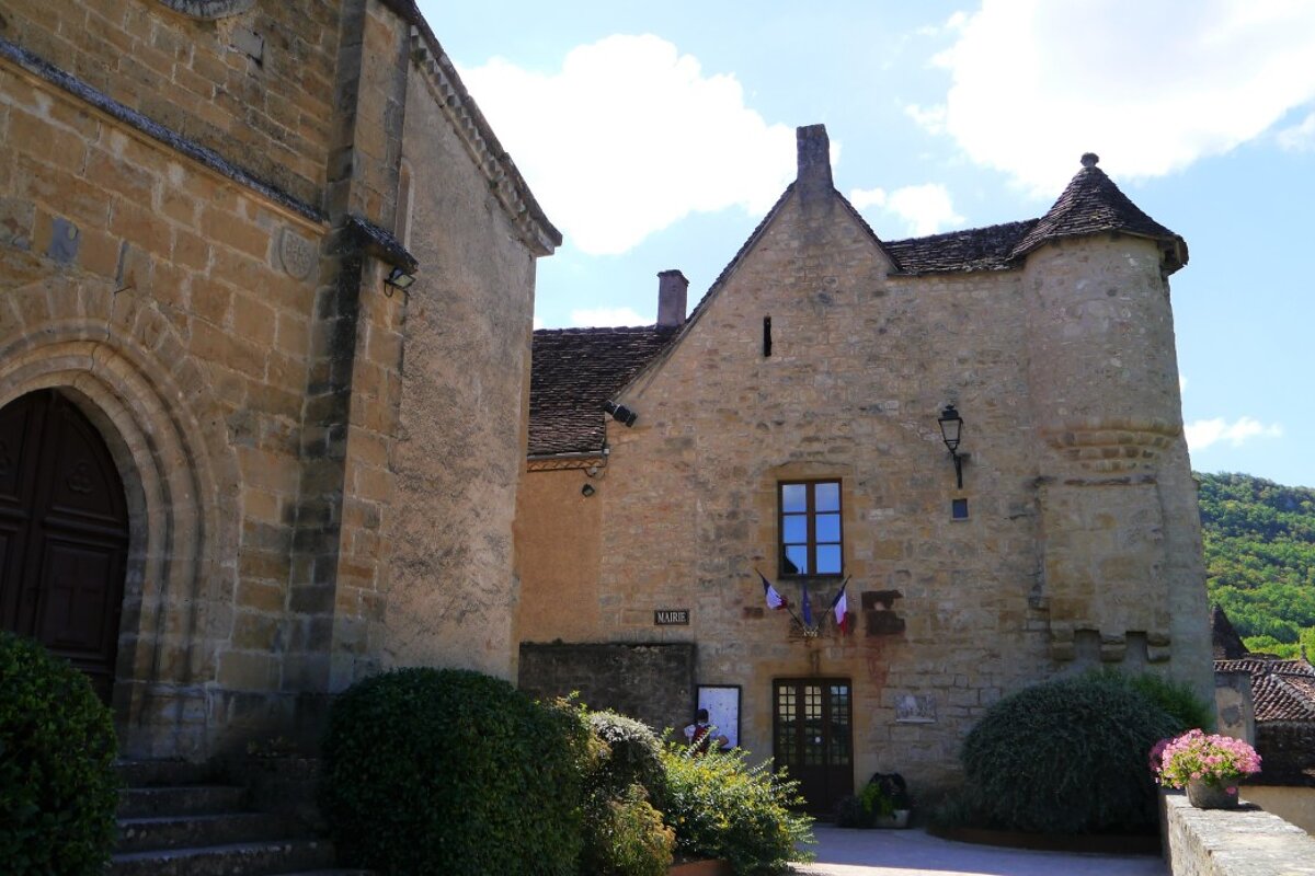 the church and the mairie in the town of autoire