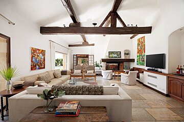A living room with a couch that says ' provence ' on it