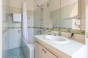 A bathroom with a sink and a bathtub