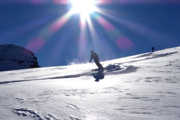 two skiers on val disere glacier