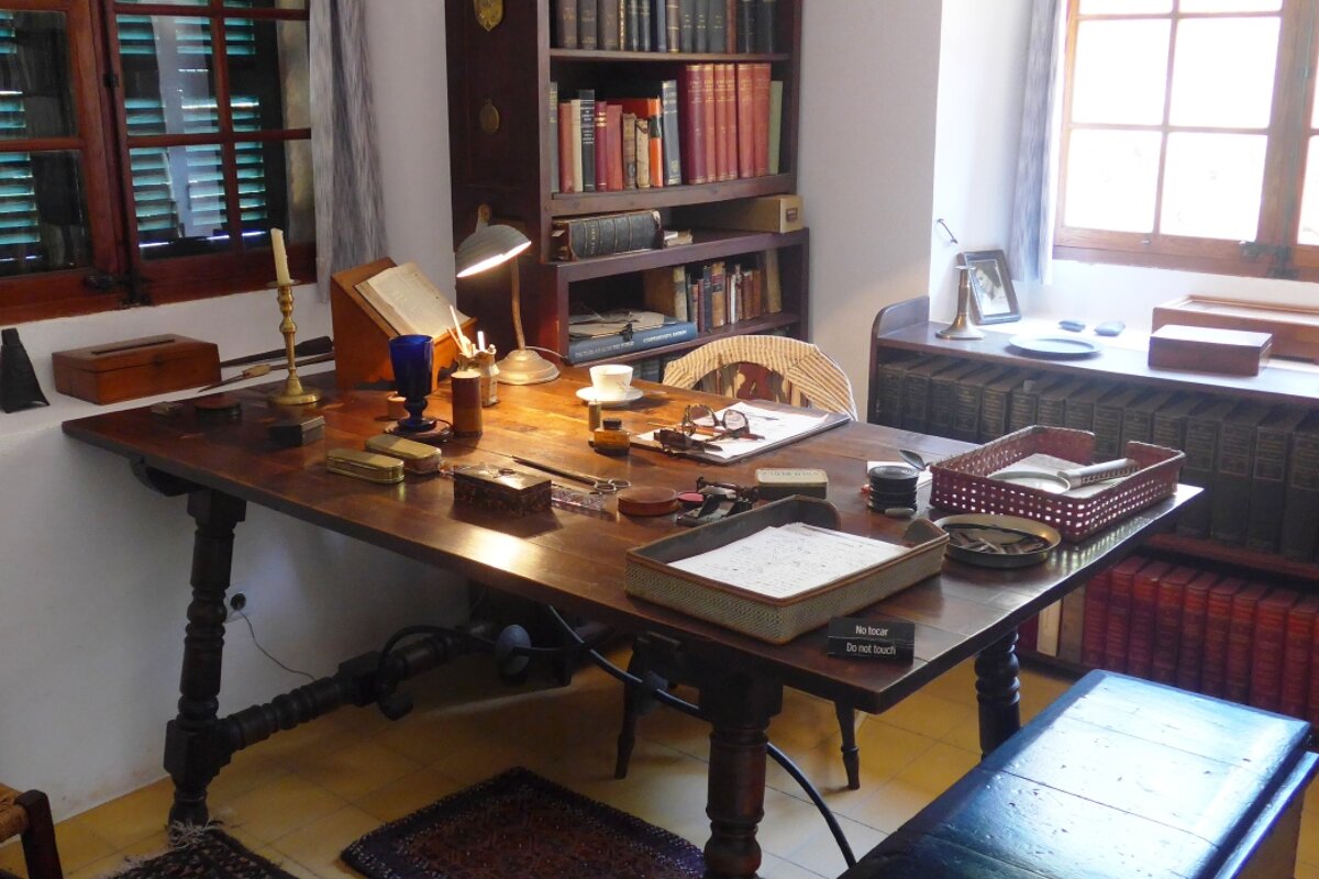 a writing desk in a museum