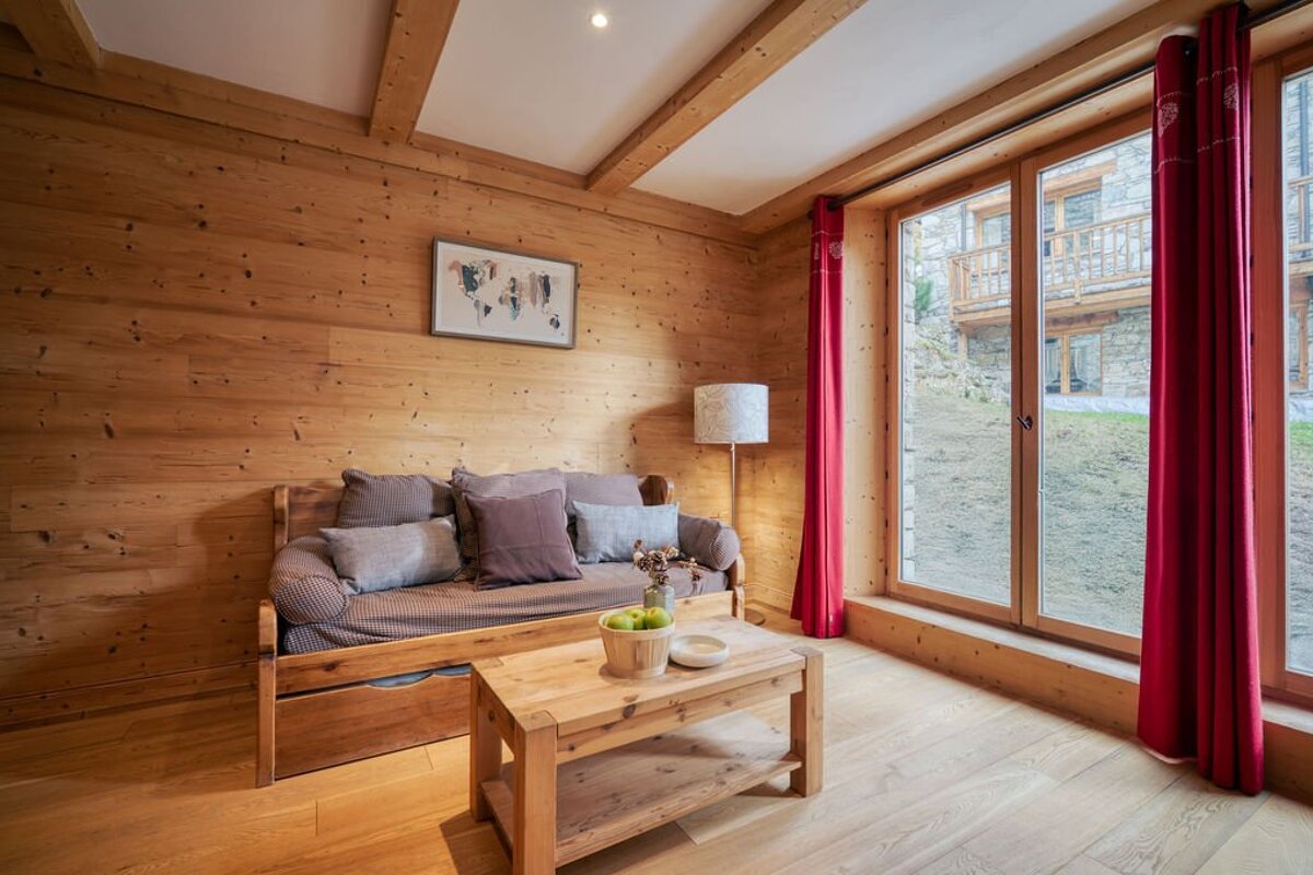 A living room with a couch and a coffee table