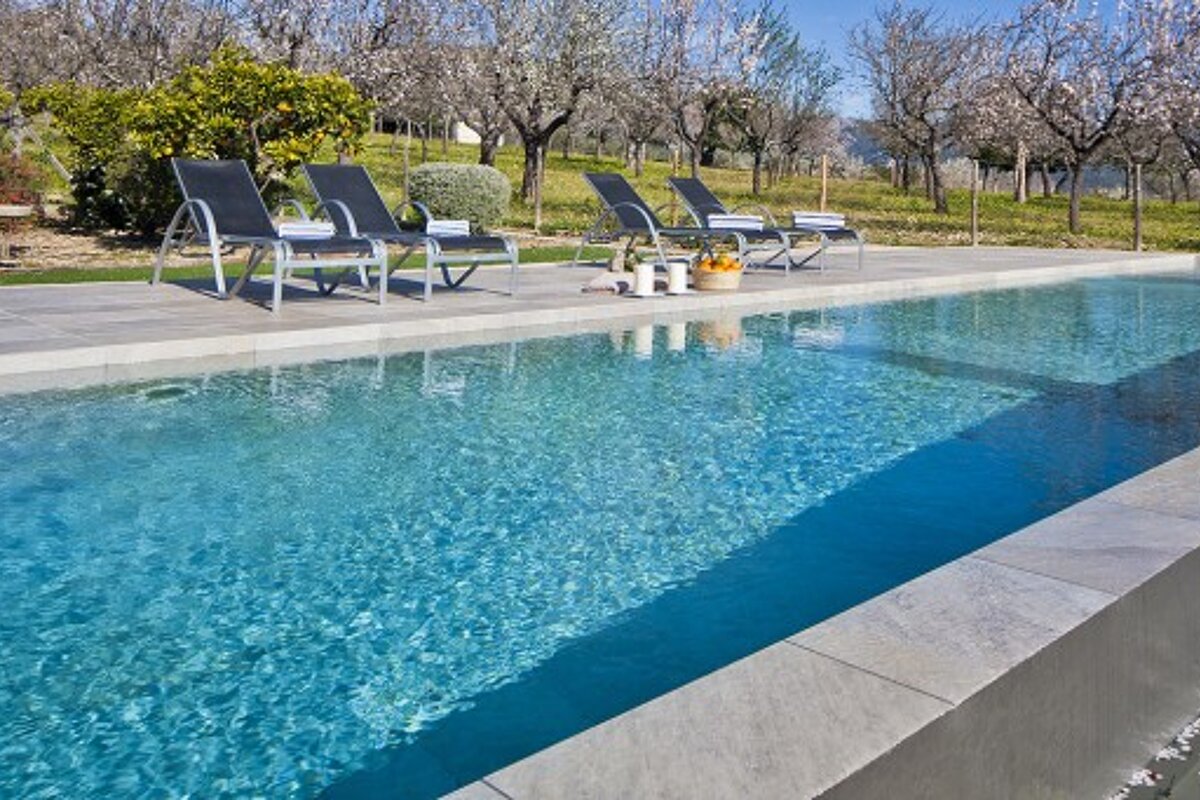 Alex & Susan Terry: Managers of Son Arnau Boutique Hotel swimming pool