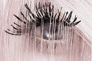 a close up photo of a model's eye