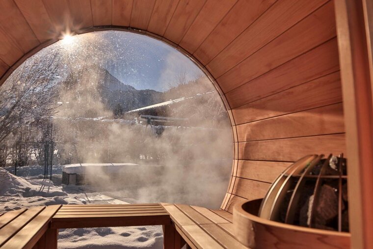 a sauna with a round window