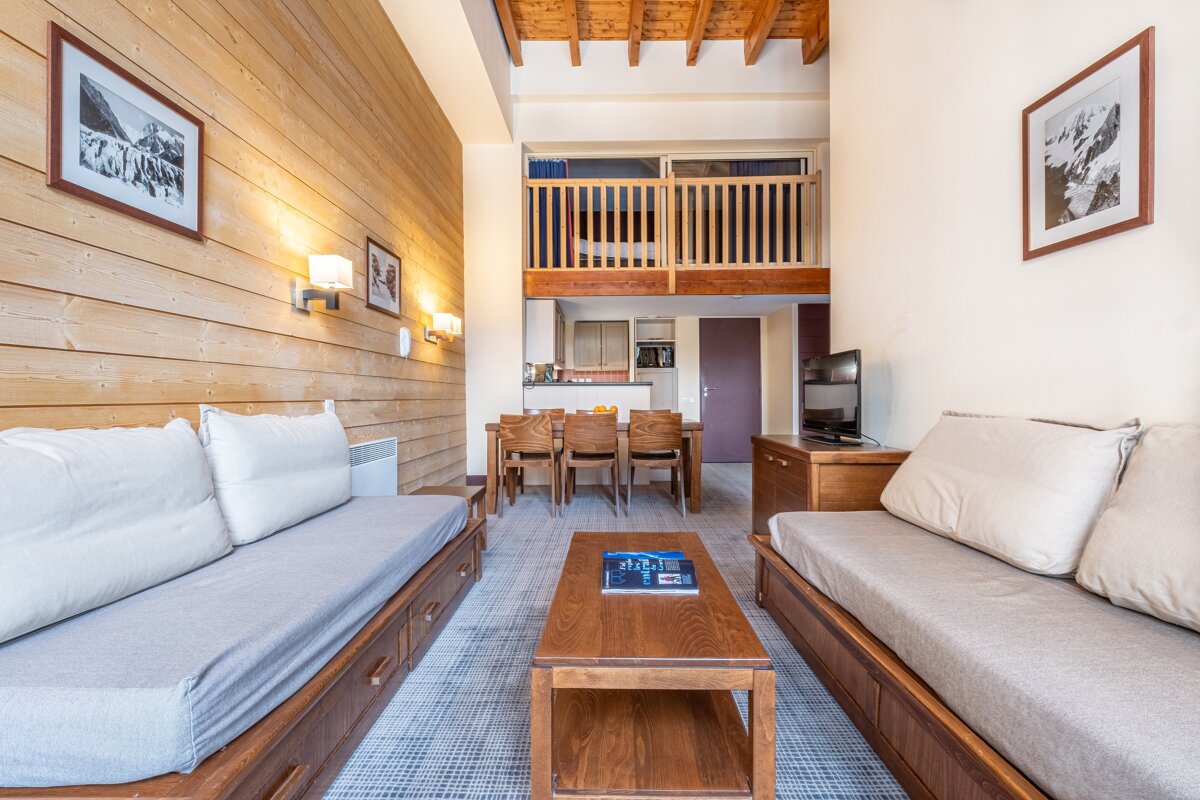 A living room with a couch and a coffee table