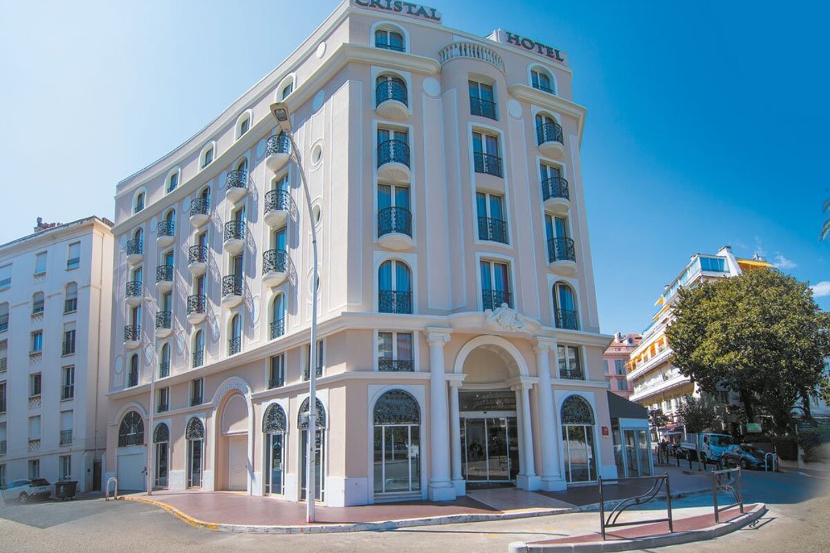 A hotel with the word cristal on the top of it