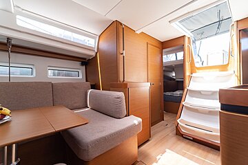 A room with a couch and a table in it