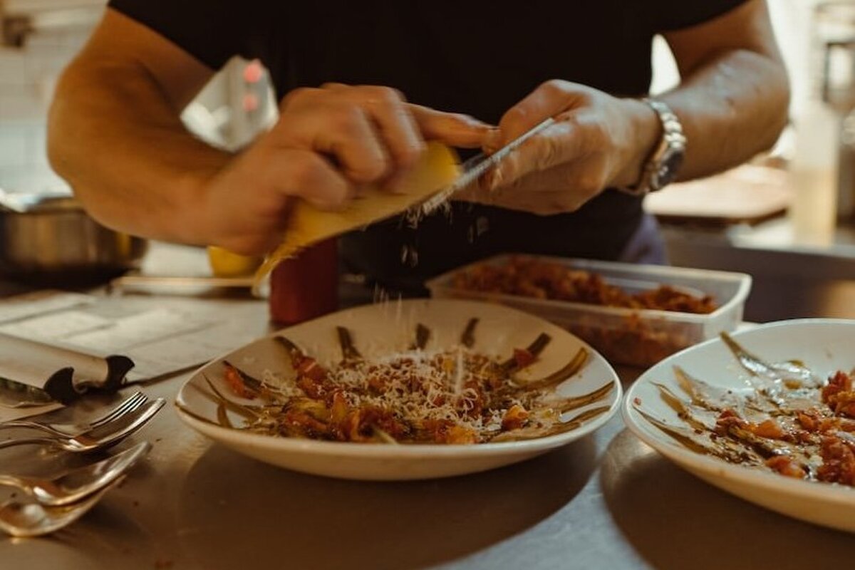 preparing a dish at Casa Maruka