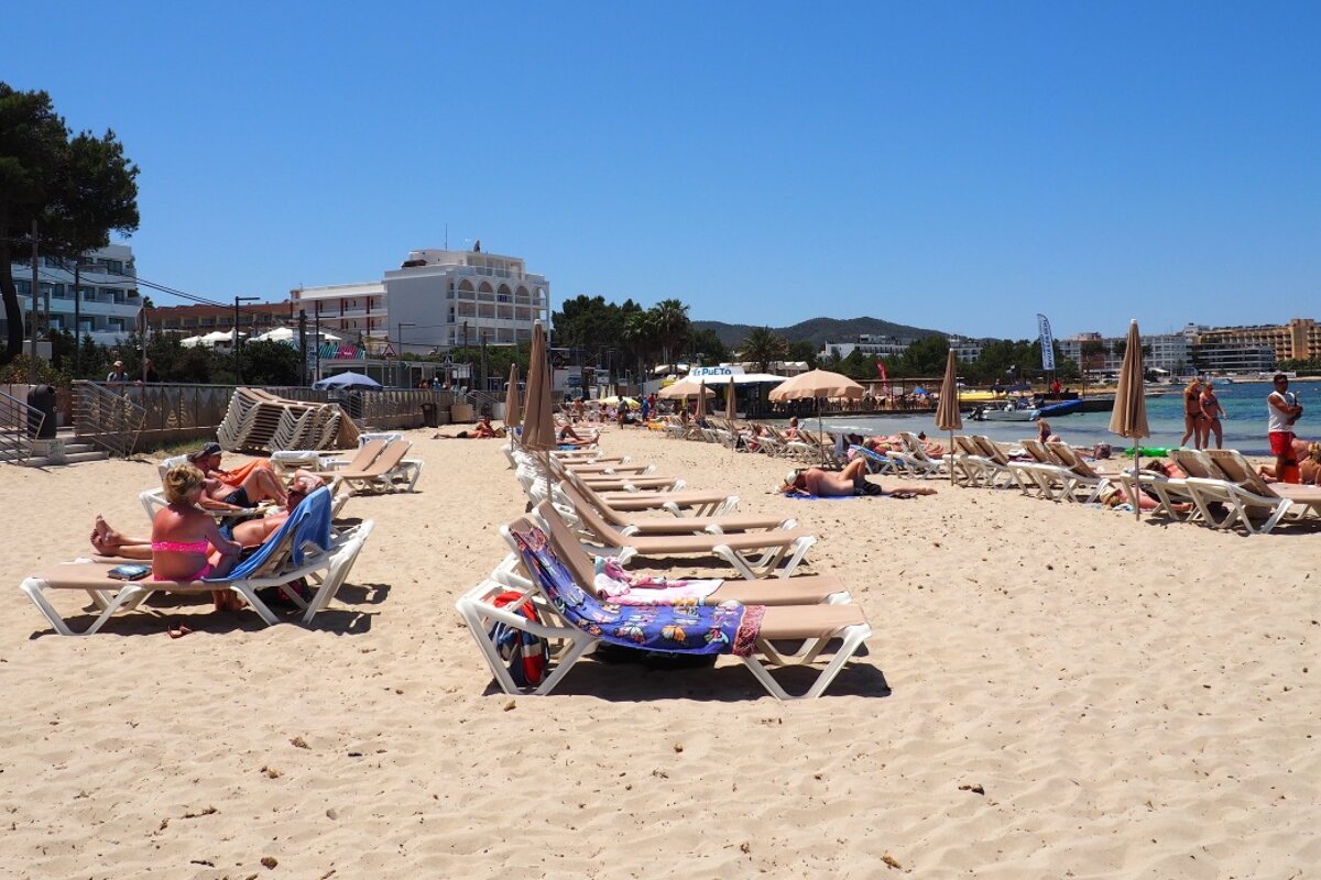 white sand beach of es pouet near san antonio