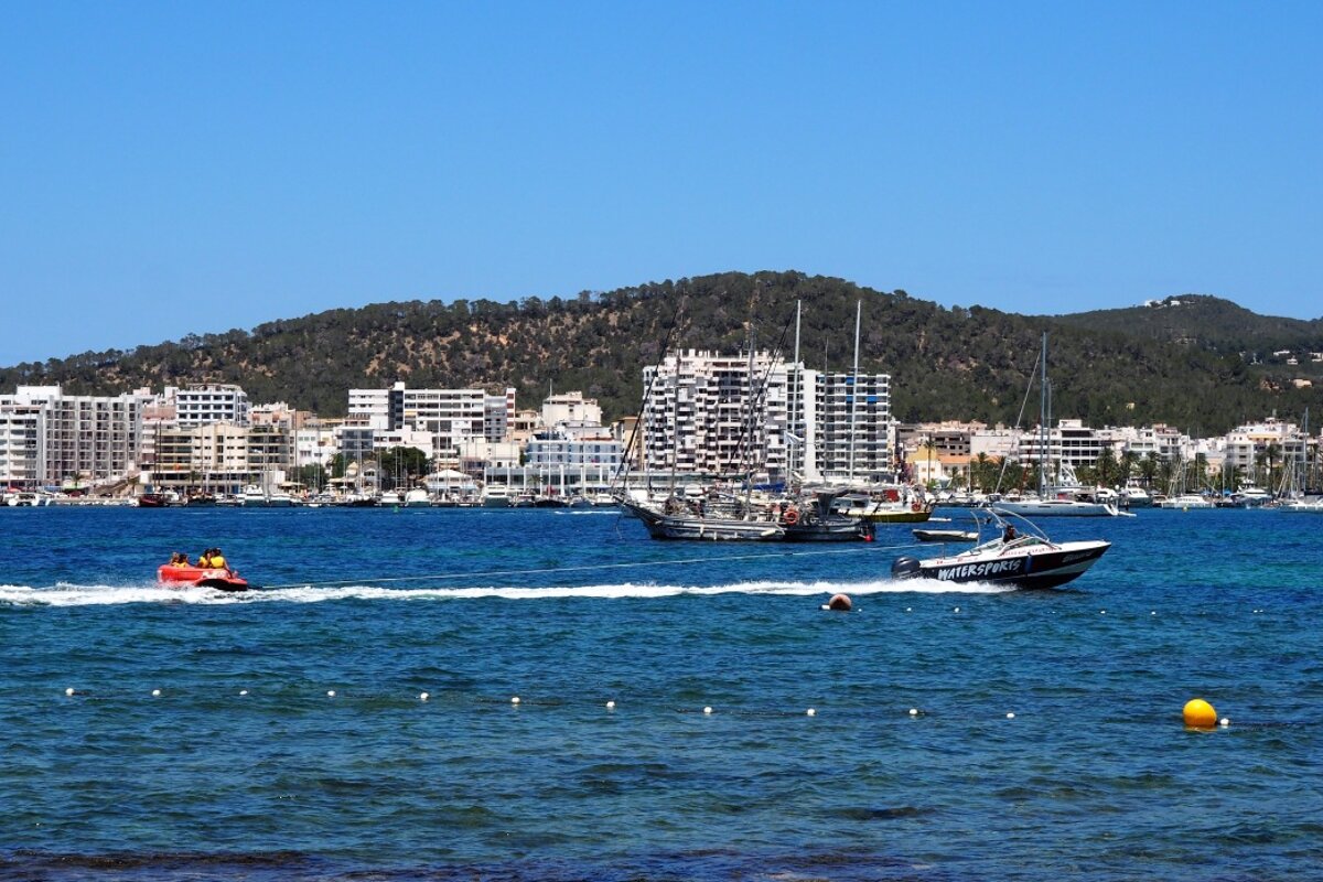 a jet boat pulling an inflatable in san antonio bay