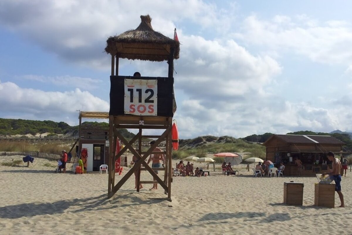 a lifeguard tower on a beach in mallorca