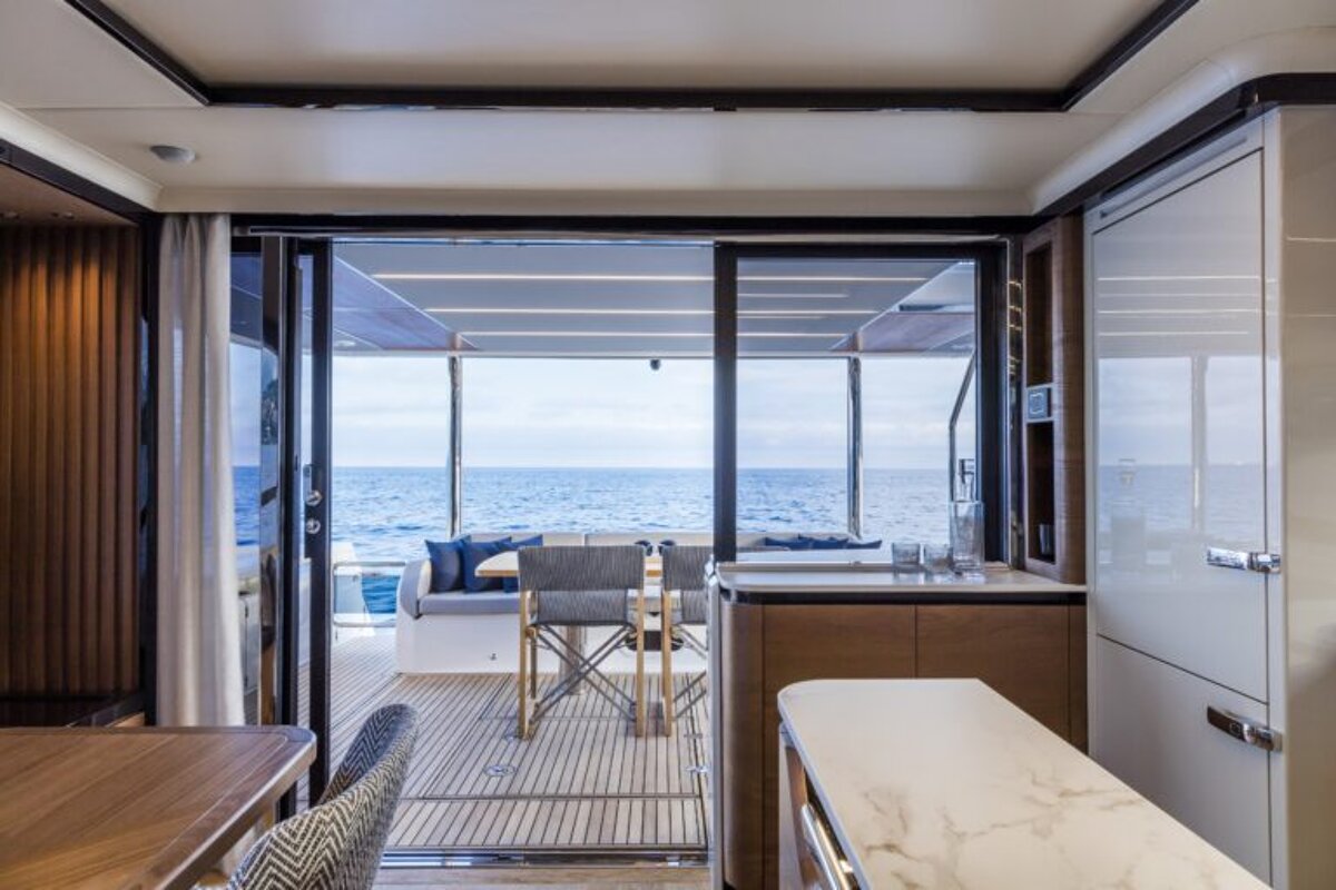 A view of the ocean from the inside of a boat