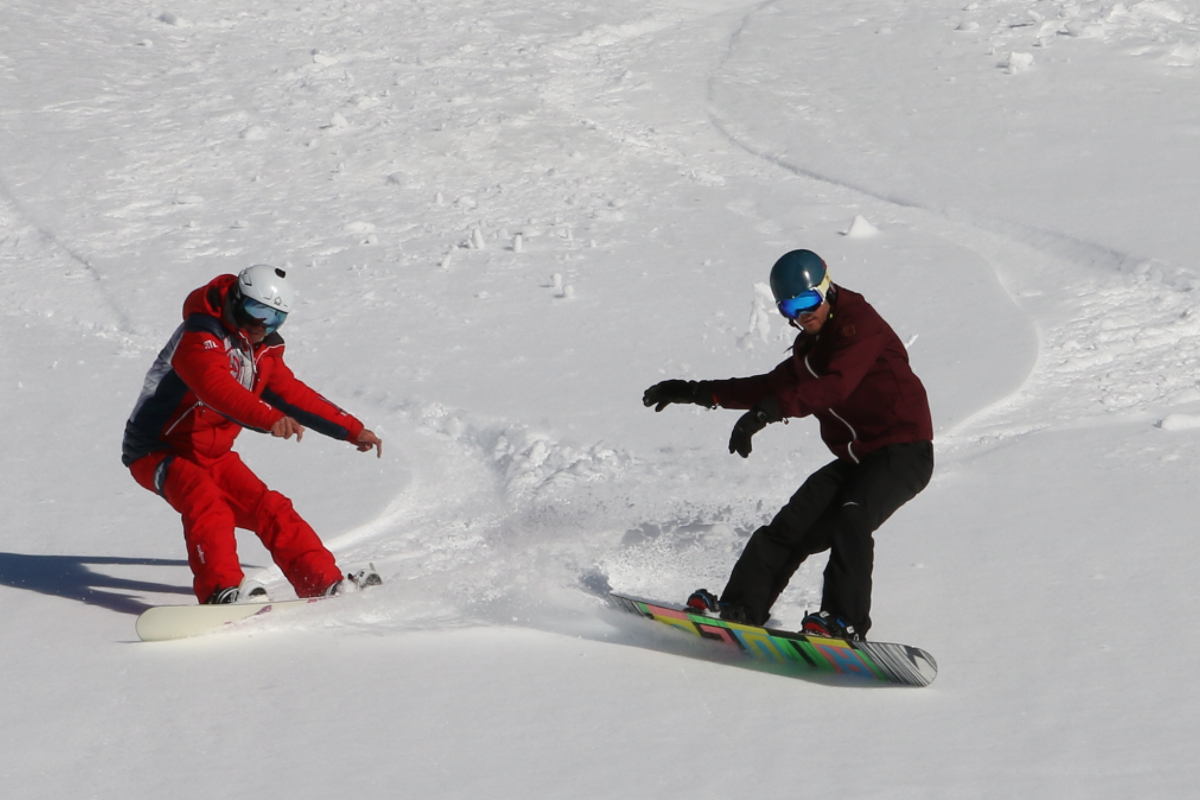 a ski instructor giving a private lesson