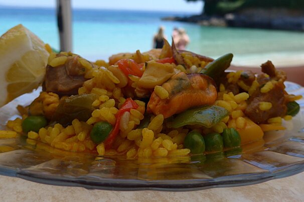 a plate of seafood paella