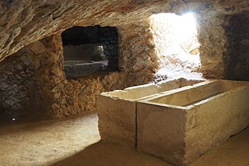 a cave with tombs in Ibiza town