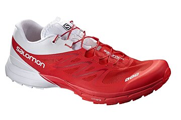 A pair of red and white salomon running shoes