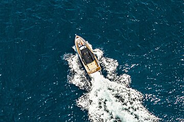 An aerial view of a boat in the ocean