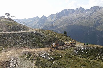 diggers on the pistes