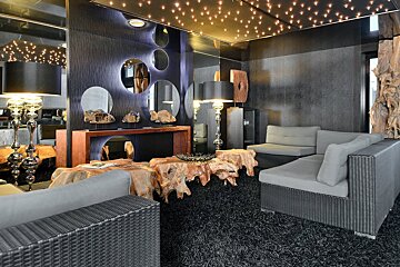 A living room with a couch and a table