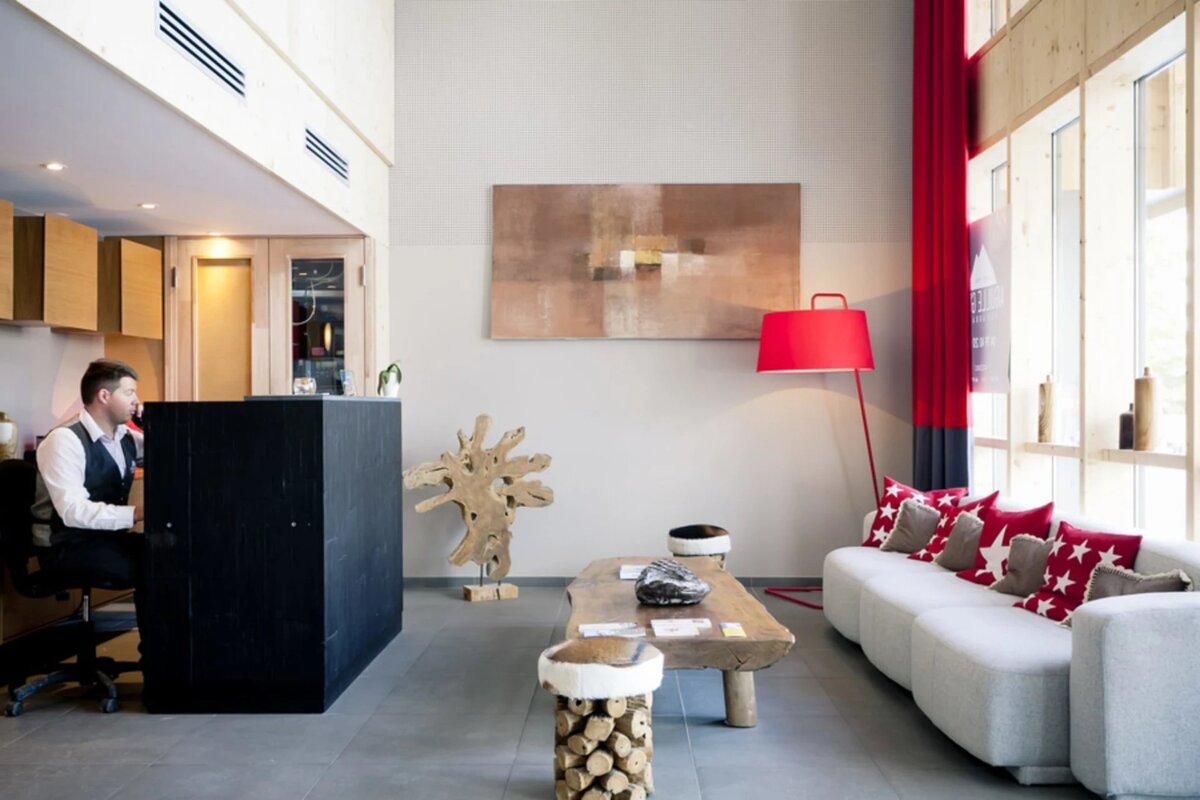 A man sitting at a counter in a living room