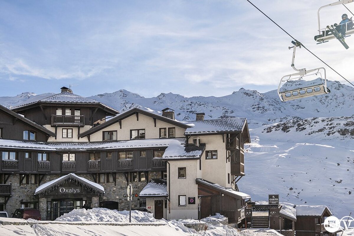 Exterior of the Oxalys Residence on a sunny winters day in Val Thorens