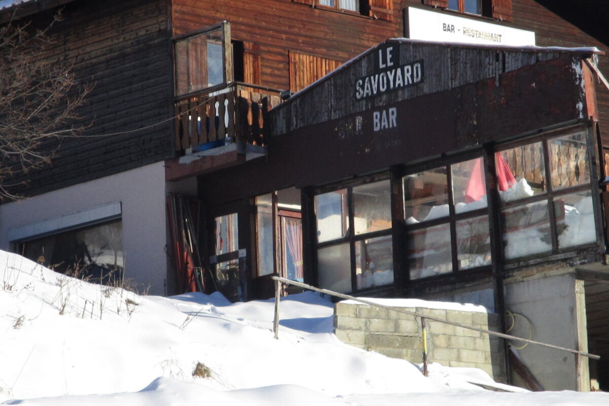 a restaurant at the bottom of the run