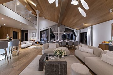 A living room filled with furniture and a fireplace