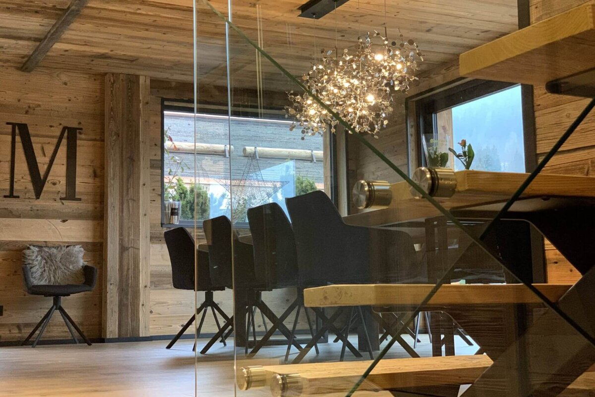 A wooden wall with the letter m on it