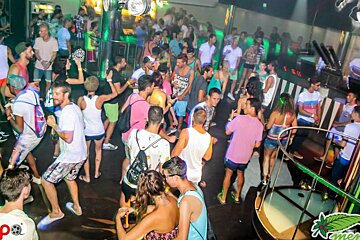 lots of people dancing in a club in mallorca