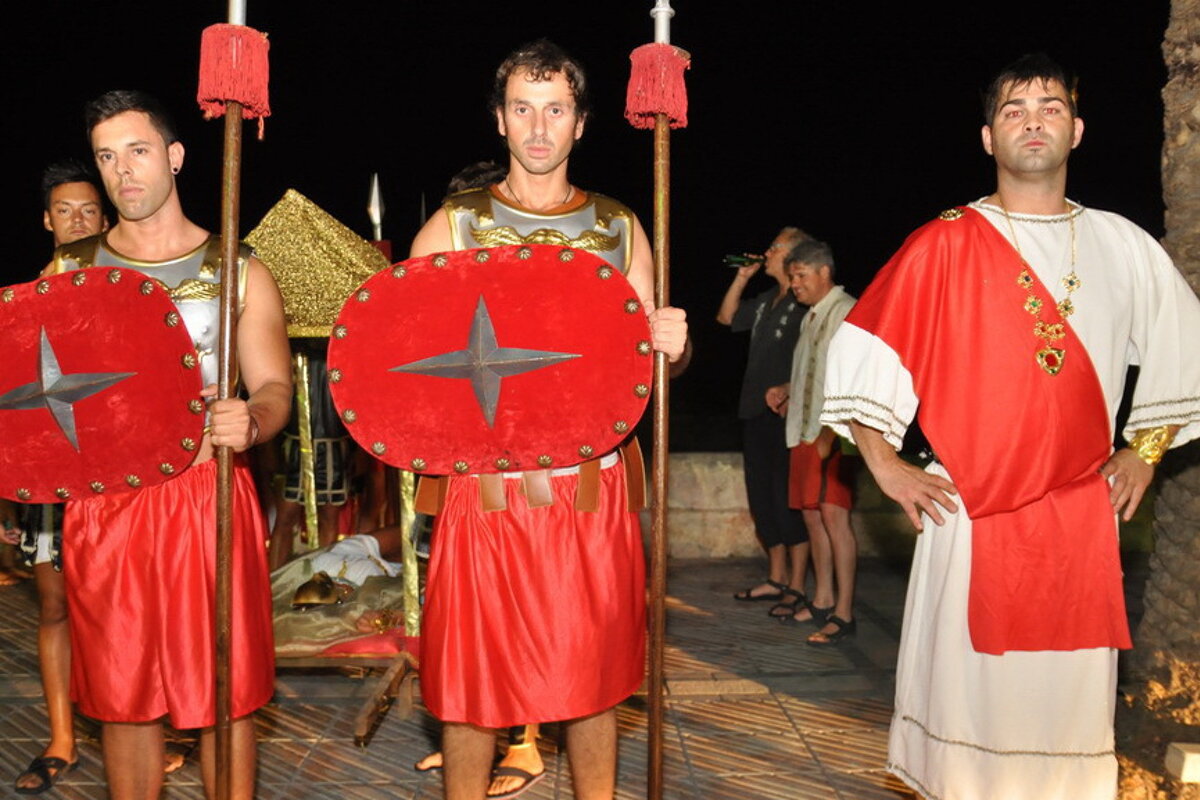 three men dressed as roman soldiers
