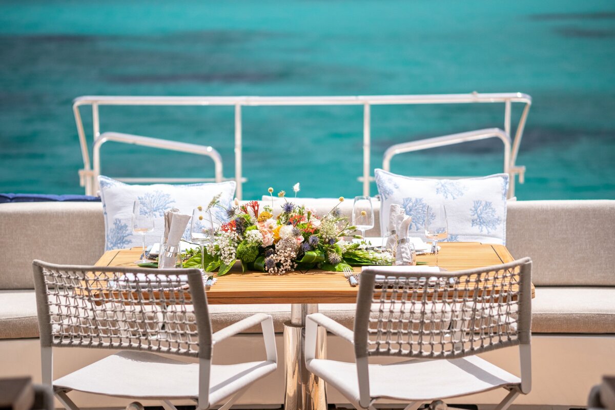 A table with a vase of flowers on it