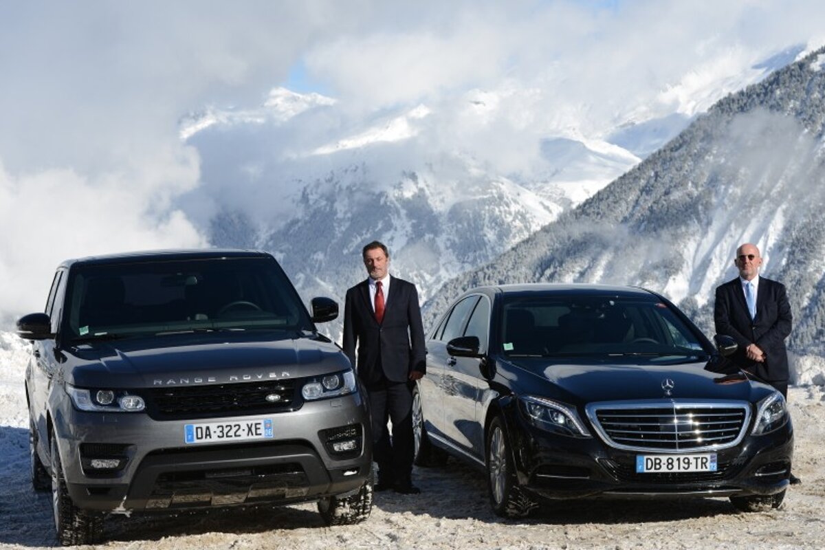 luxury vehicles in a ski resort