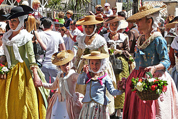 People of saint tropez dressed in traditional costume