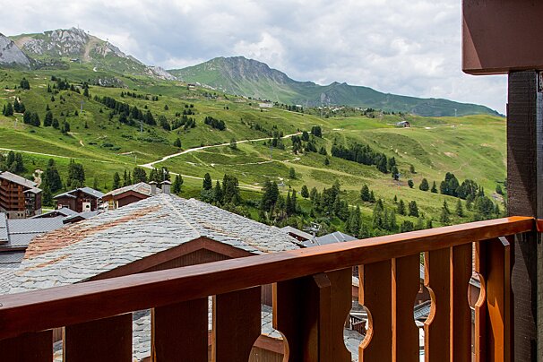 A view of a mountain range from a balcony