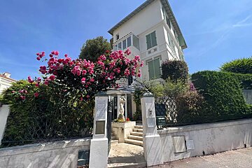 A building with a sign that says ' a ' on it