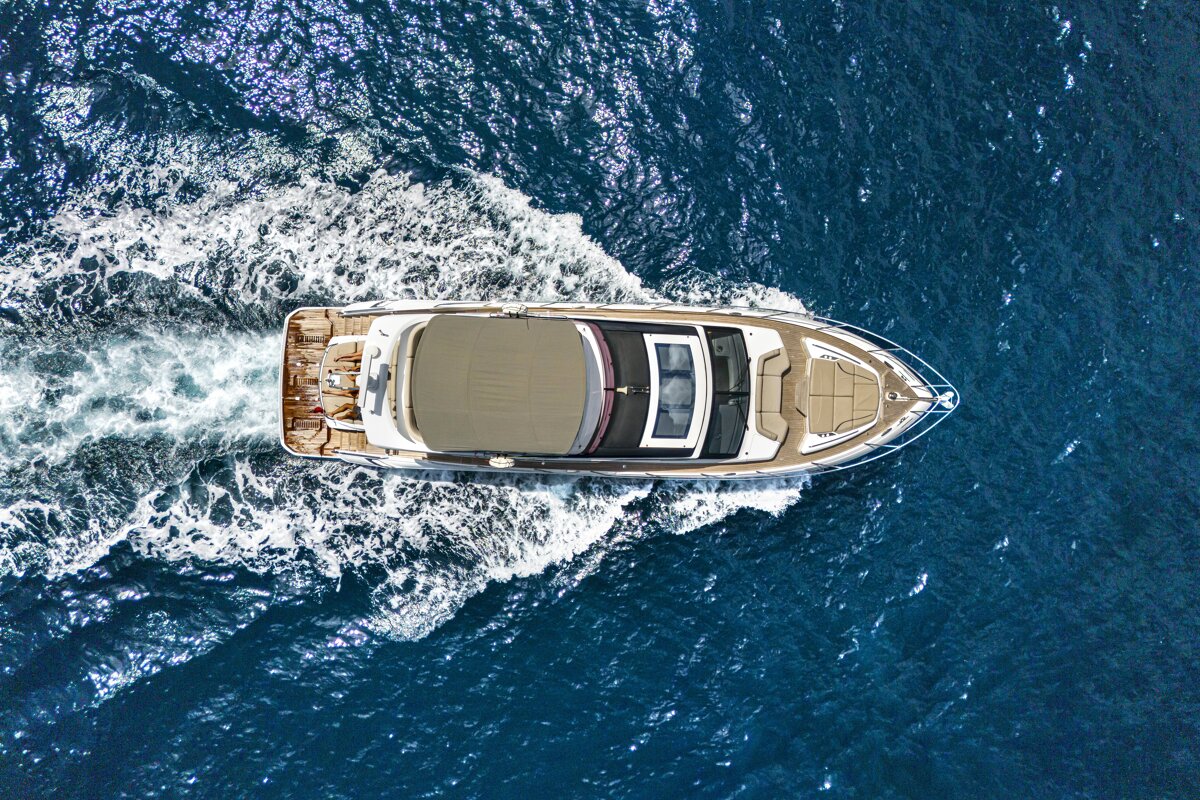 An aerial view of a boat in the ocean