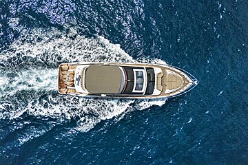 An aerial view of a boat in the ocean
