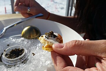 someone eating caviar