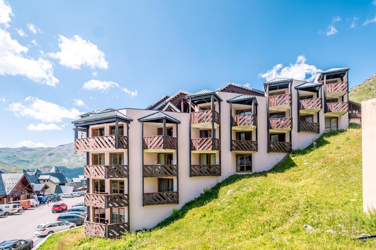 A building with a lot of windows and balconies