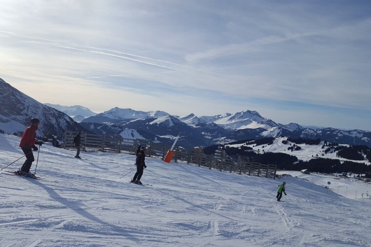 skiers on a piste near morzine