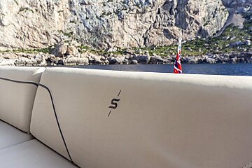 The letter s is on the back of a boat