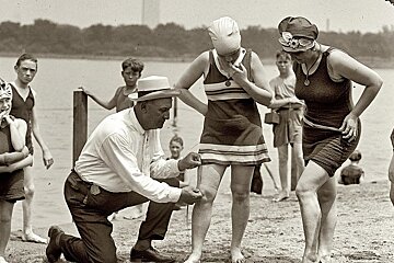 a black & white image of women in swimsuits