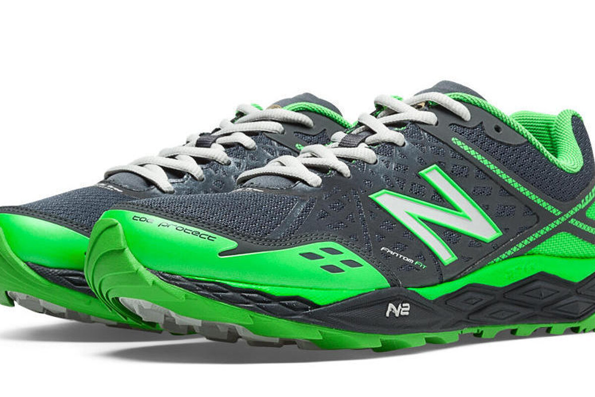 green and black running shoes