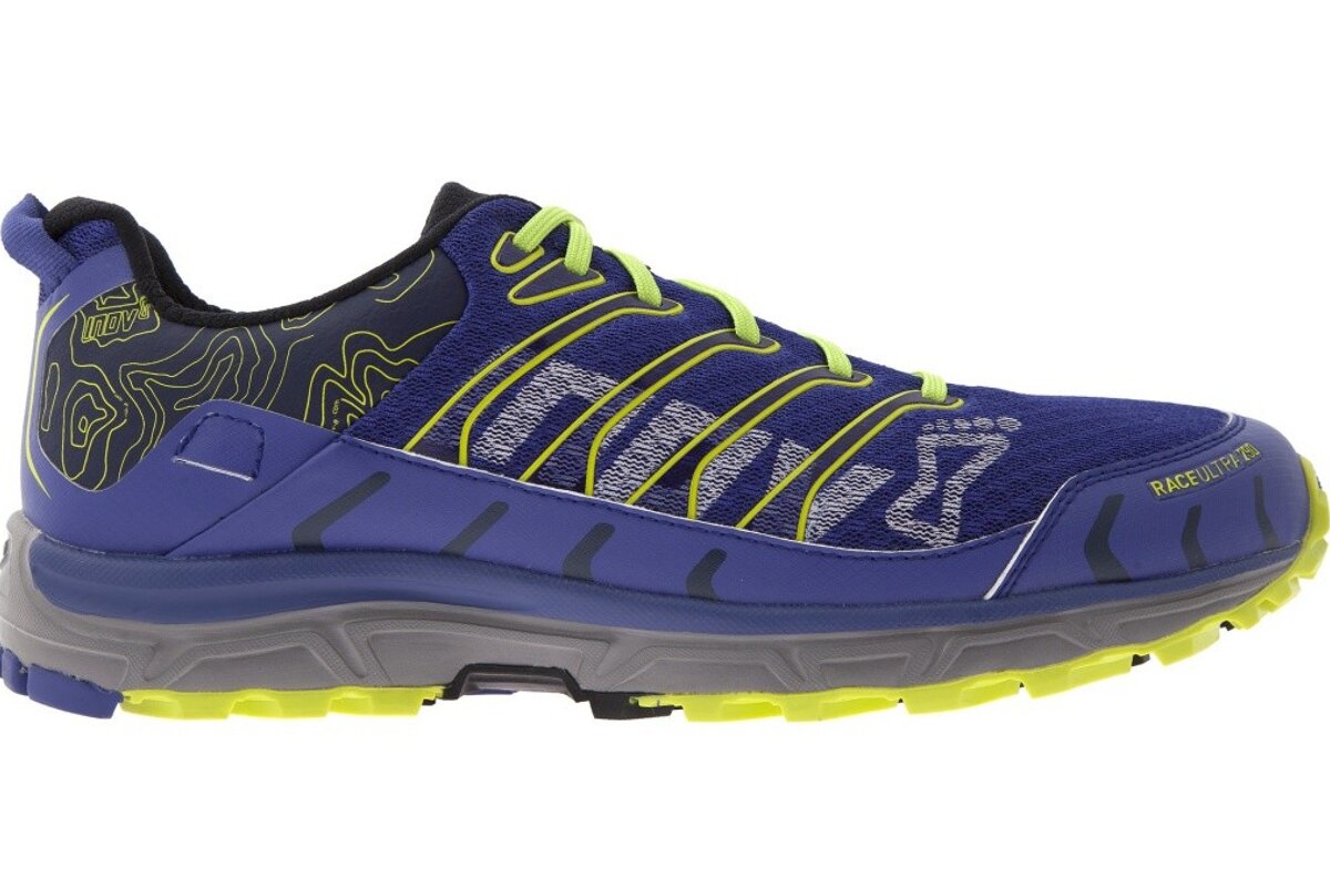 a purple & green trail shoe