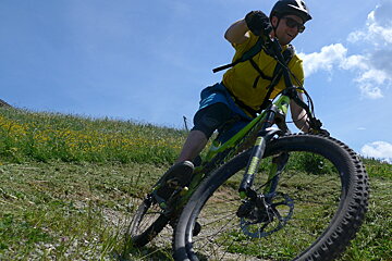a mountain biker on a corner