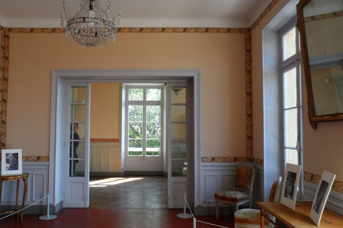 a drawing room in a museum for Renoir