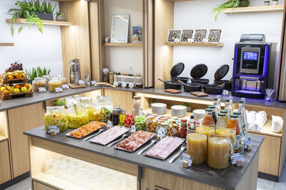 A buffet table with a sign that says ' juice ' on it