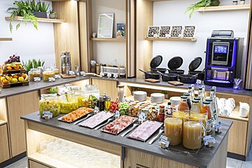 A buffet table with a sign that says ' juice ' on it