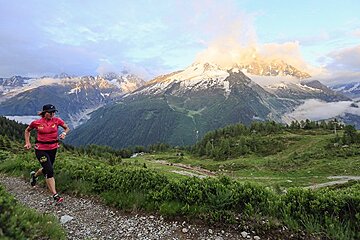 a woman trail running